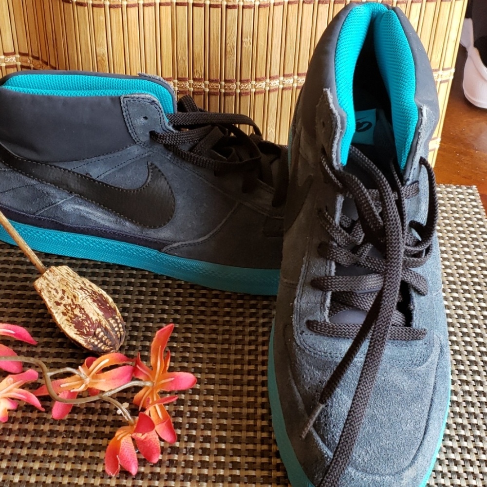 Nike distressed look tennis shoes.
